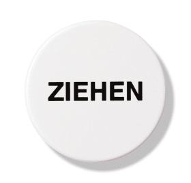 HEWI Symbol "Ziehen", selbstklebend, Ø52 mm, 2 mm dick, hochwertiges Polyamid